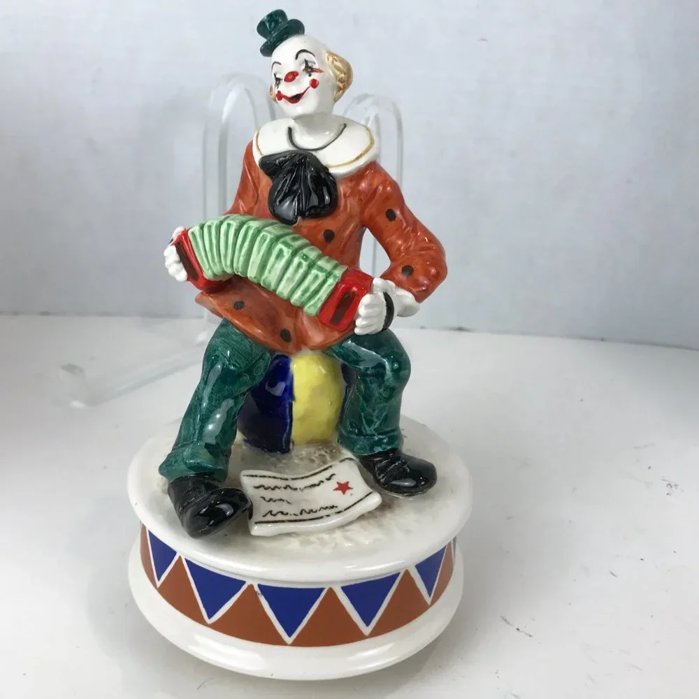 Hand painted ceramic clown music box signed by the artist